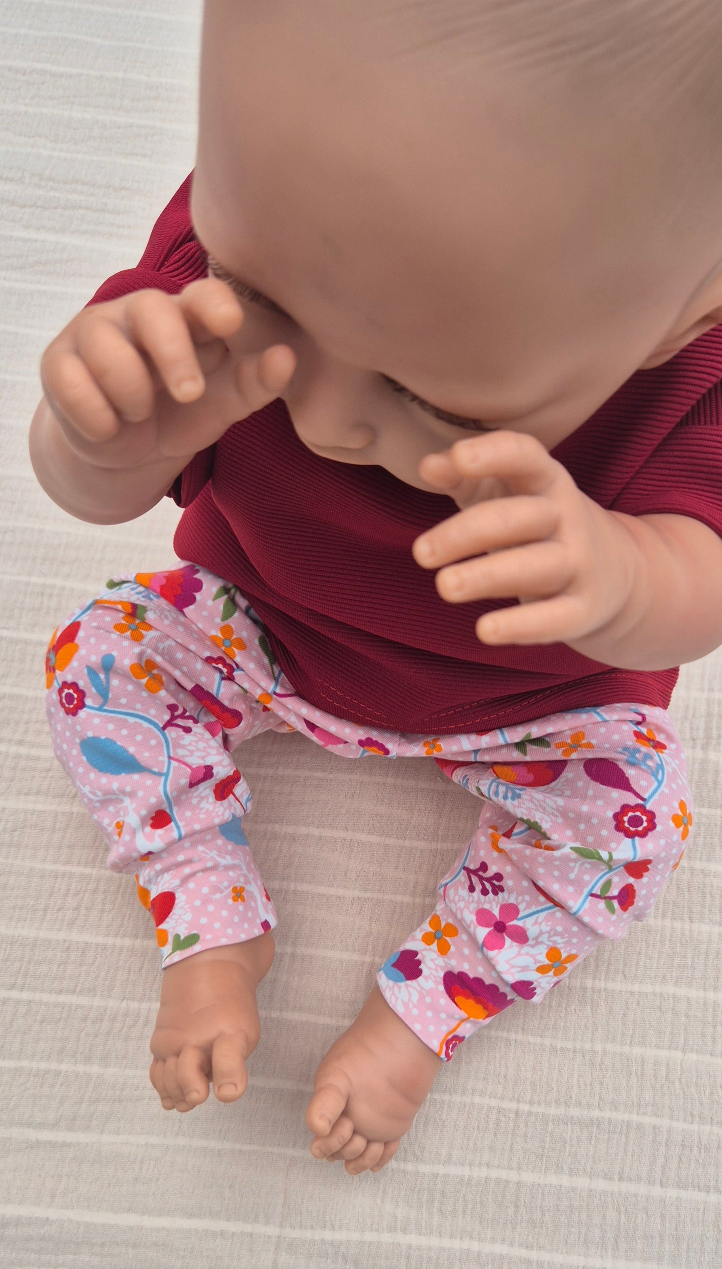 ■ Roze babybroekje met Bloemenprint