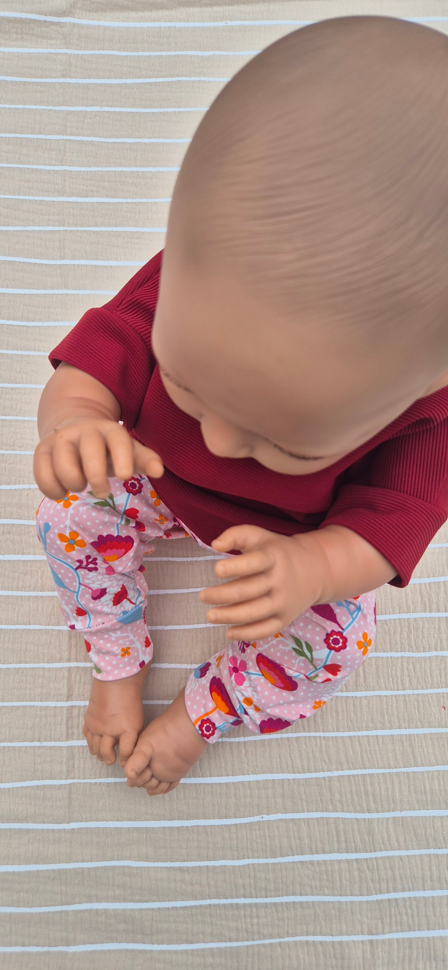 ■ Roze babybroekje met Bloemenprint