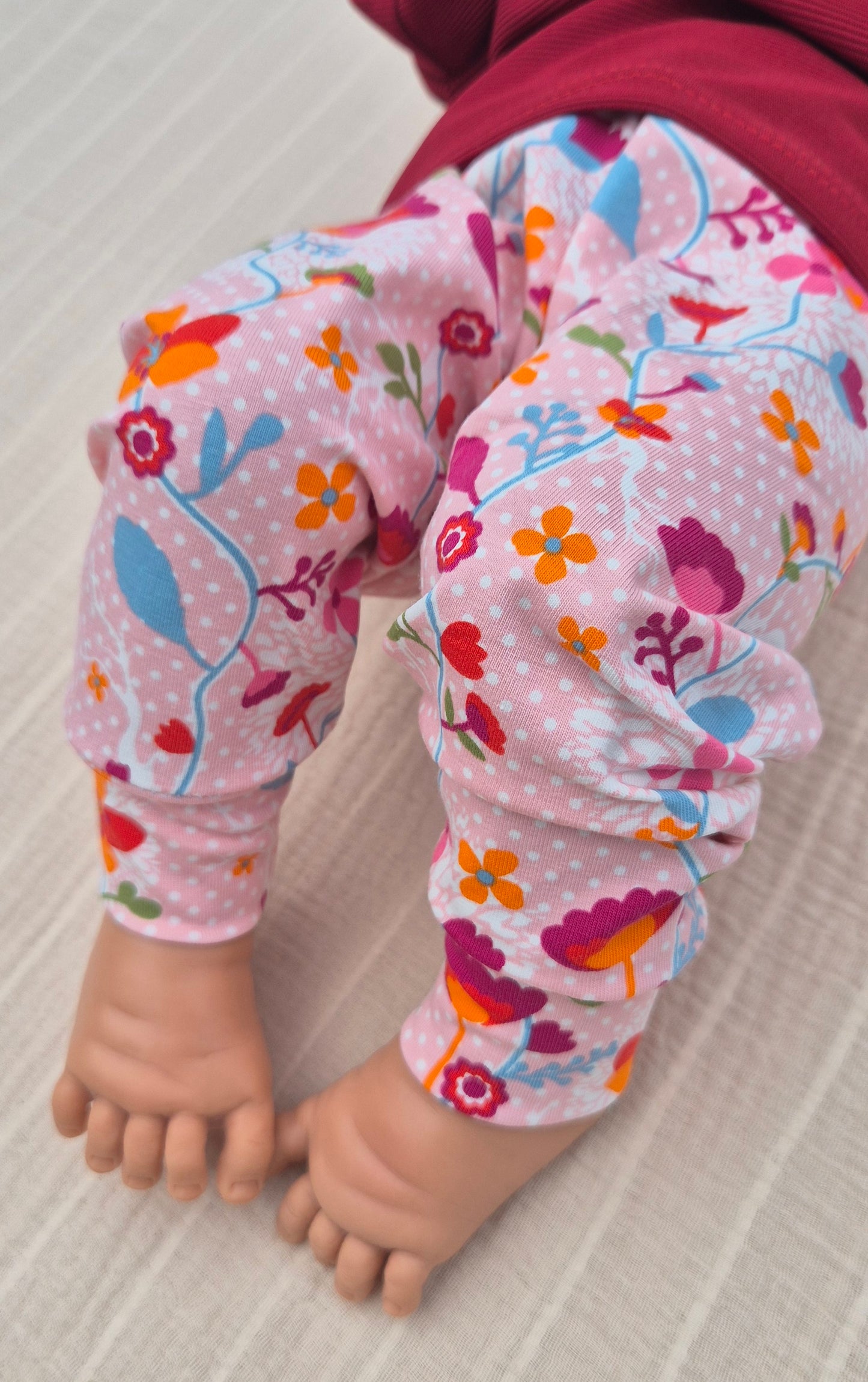 ■ Roze babybroekje met Bloemenprint