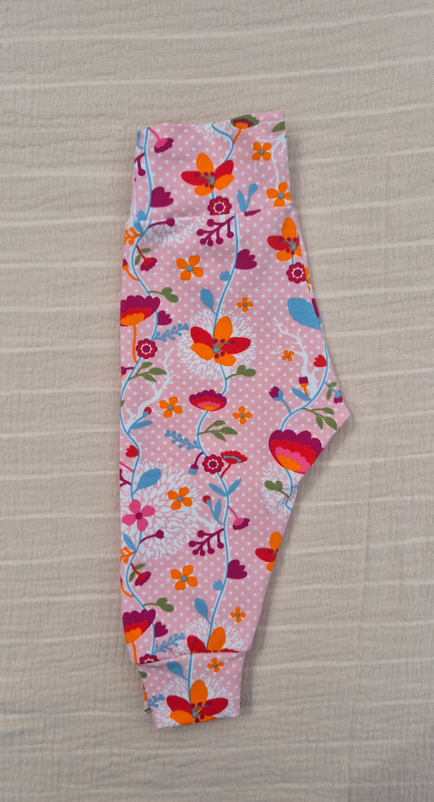 ■ Roze babybroekje met Bloemenprint